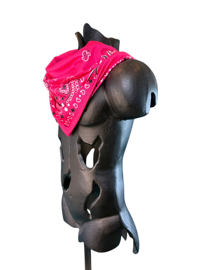 Angled view of the Fuchsia Stash Bandana showing the paisley pattern and concealed zipper pocket