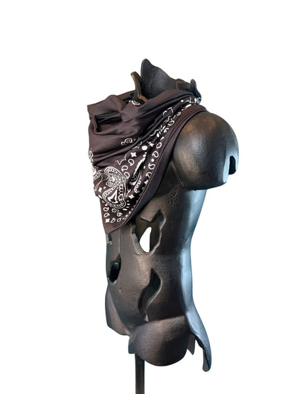Angled view of the Black Stash Bandana showing the paisley pattern and concealed zipper pocket