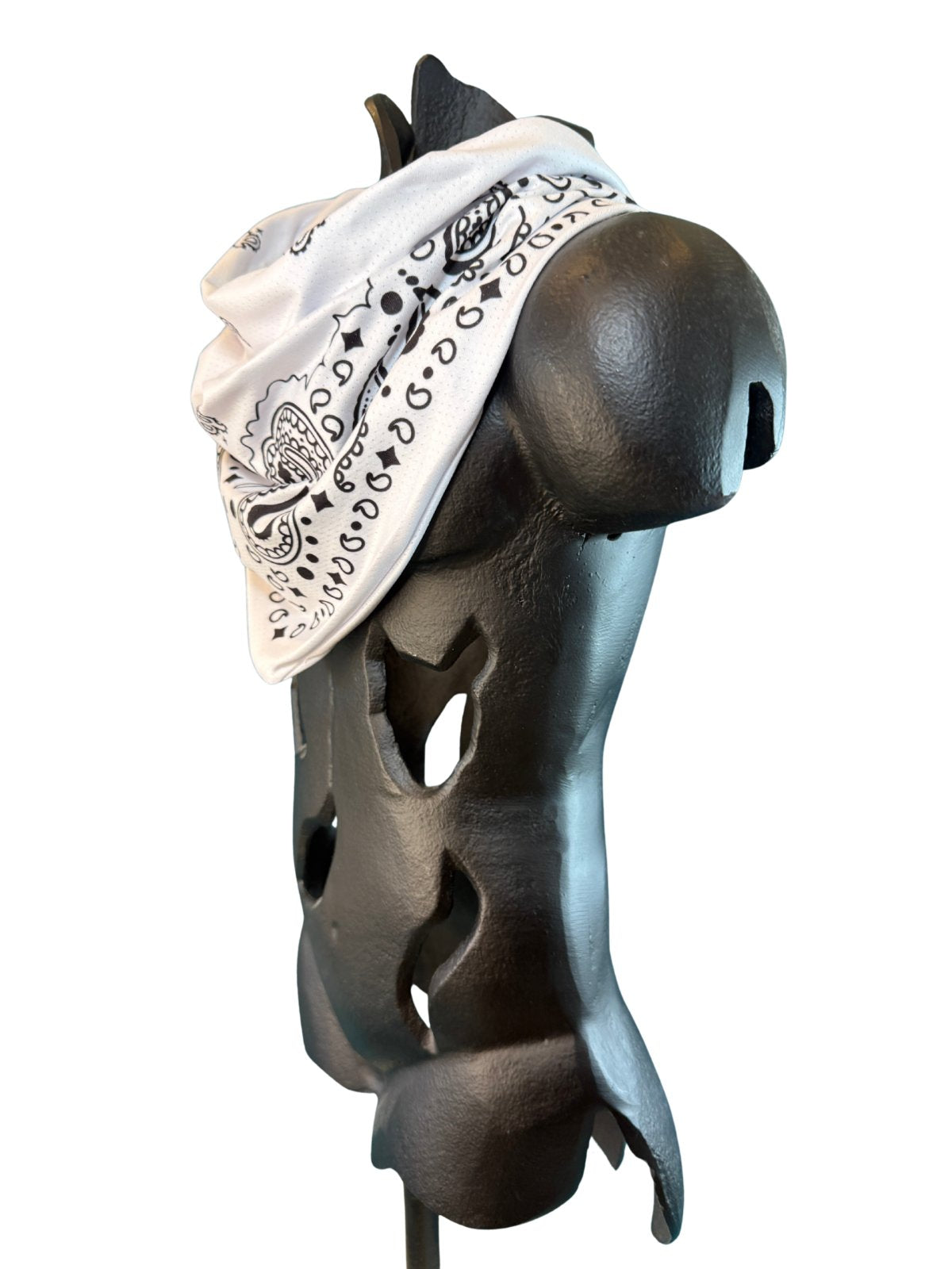 Angled view of the White Stash Bandana showing the paisley pattern and concealed zipper pocket