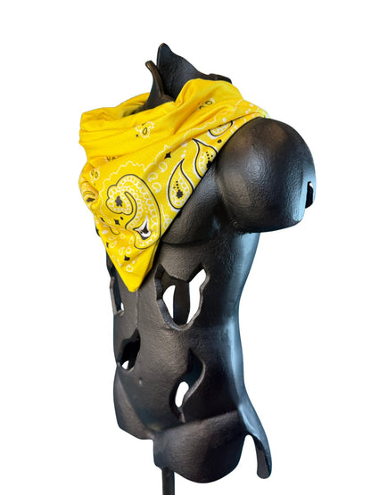 Angled view of the Yellow Stash Bandana showing the paisley pattern and concealed zipper pocket